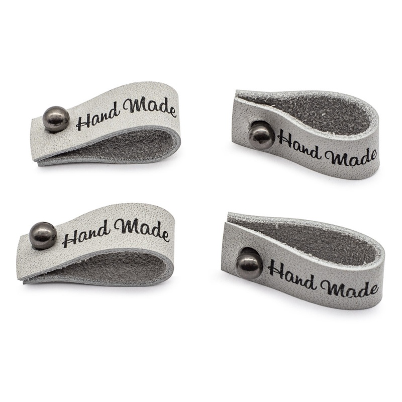 Бирка кожаная с кнопкой "Hand Made" цв. светло-серый 1,3*7см набор 4шт. за 1шт. 559227														