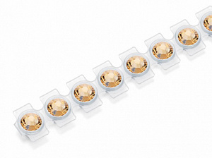 Стразы "Swarovski Elements" d=2.8мм на пластиковой ленте цв. light topaz в катридже 42шт. за 1шт. 5002025														